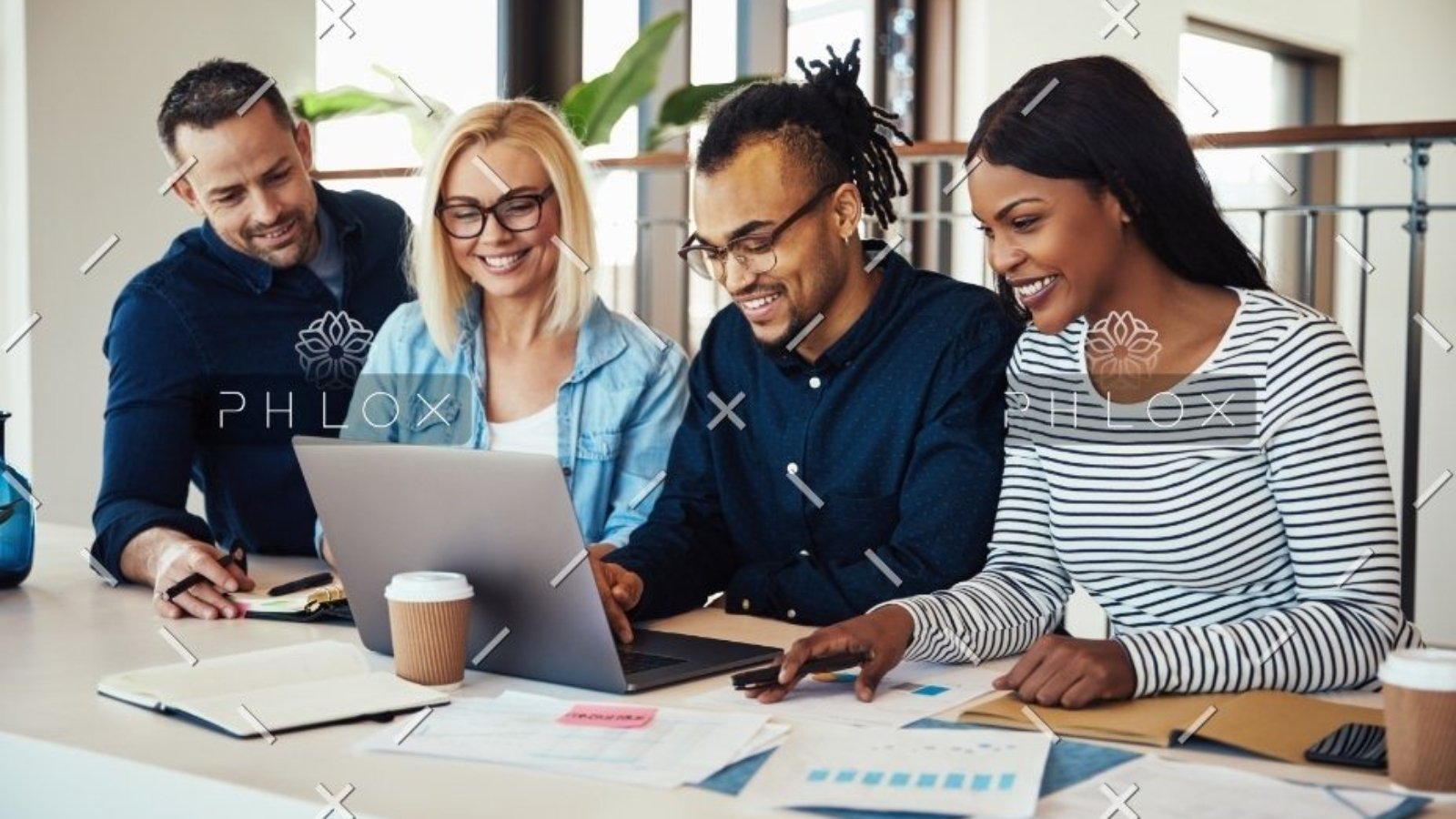 demo-attachment-53-diverse-group-of-colleagues-working-together-at-NVRVQEJ